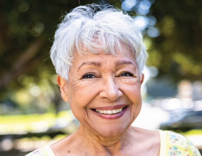 Senior woman smiling about her assisted living community
