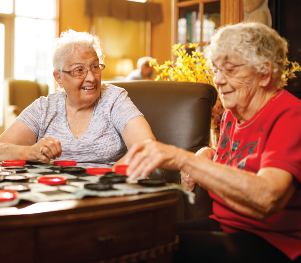 senior women playing cards