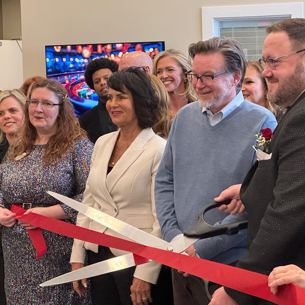 Ribbon cutting with big scissors